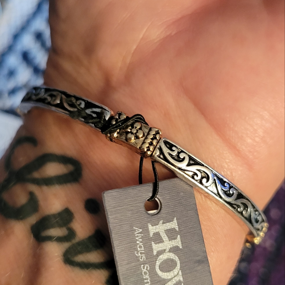 Howards silver and gold tone stretchy bracelet
